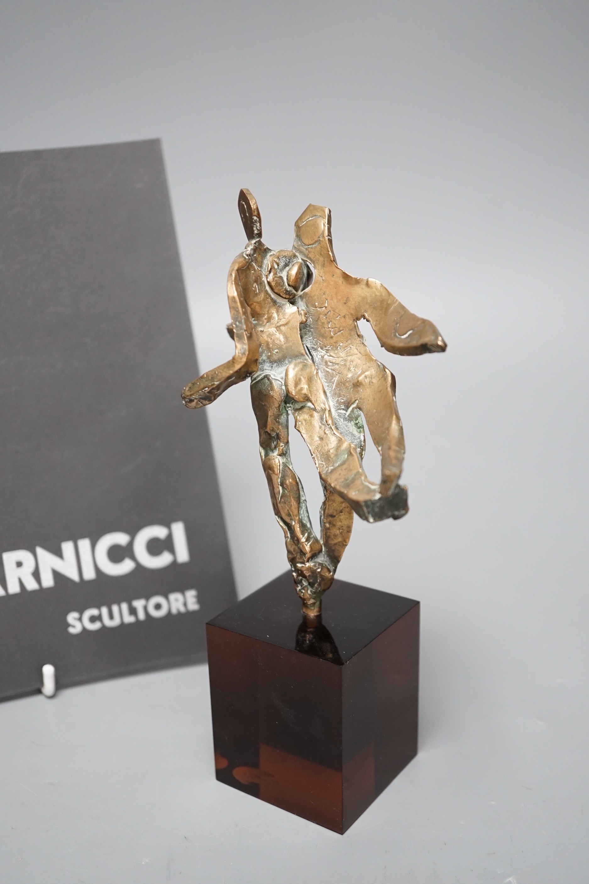 Emanuele Scarnicci (b.1916-?), a cast bronze abstract figure, with exhibition catalogues, 20cm